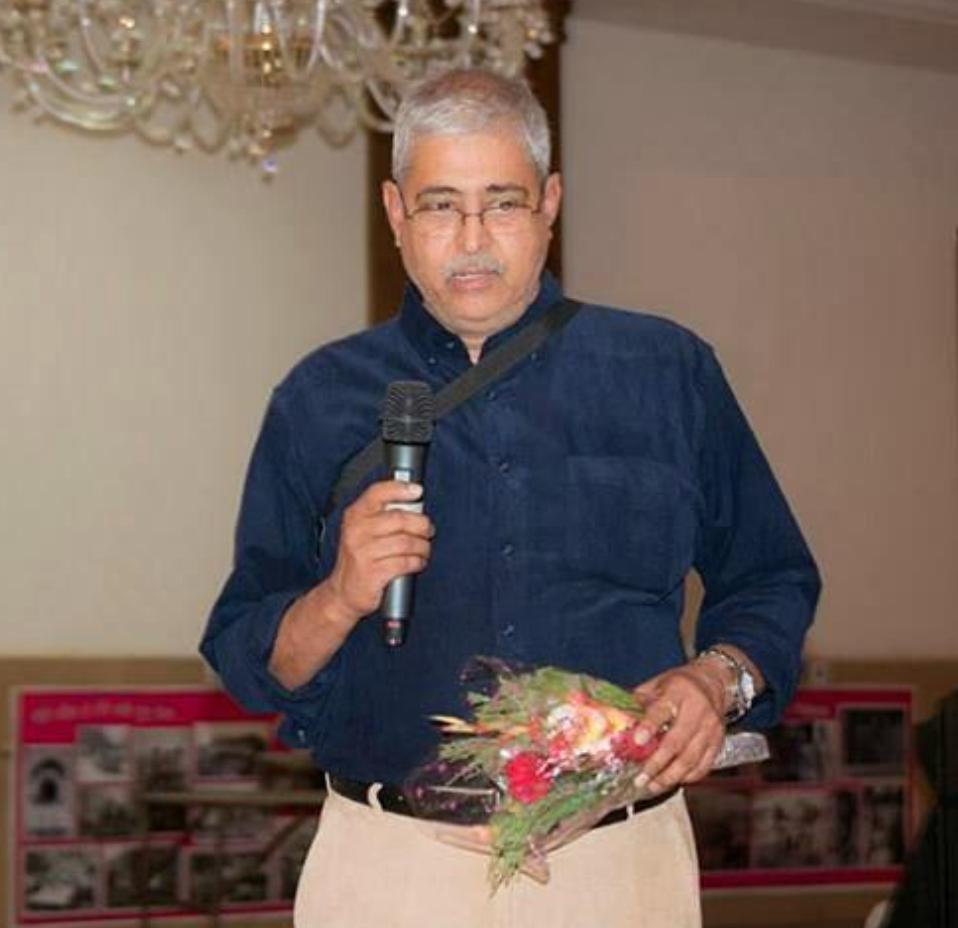 Dr. Vilas Tambe