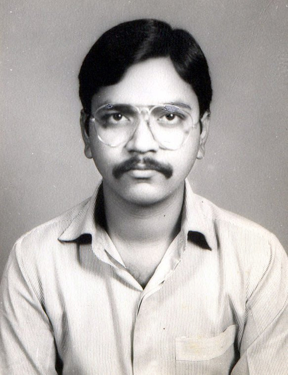 Black and white portrait of Dr. V. K. Gupta, alumnus of the MGIMS Sevagram Class of 1976.